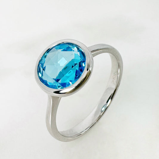 14k White Gold Blue Topaz Ring