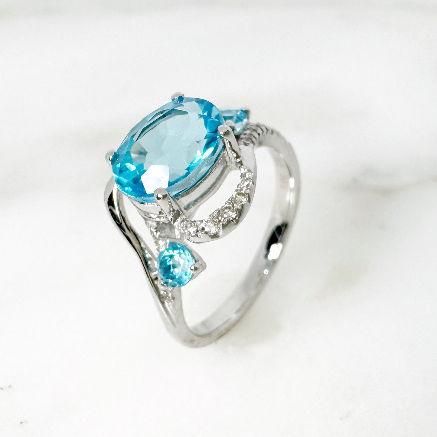 14K White Gold Oval Blue Topaz Ring with Diamonds