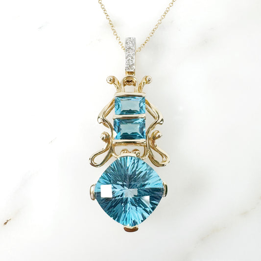 14k Yellow Gold Swiss Blue Topaz Pendant with Diamonds