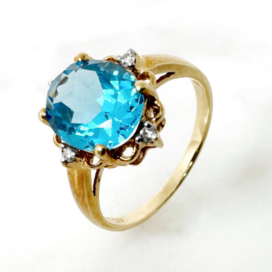 18K Yellow Gold Oval Blue Topaz Ring with Diamonds